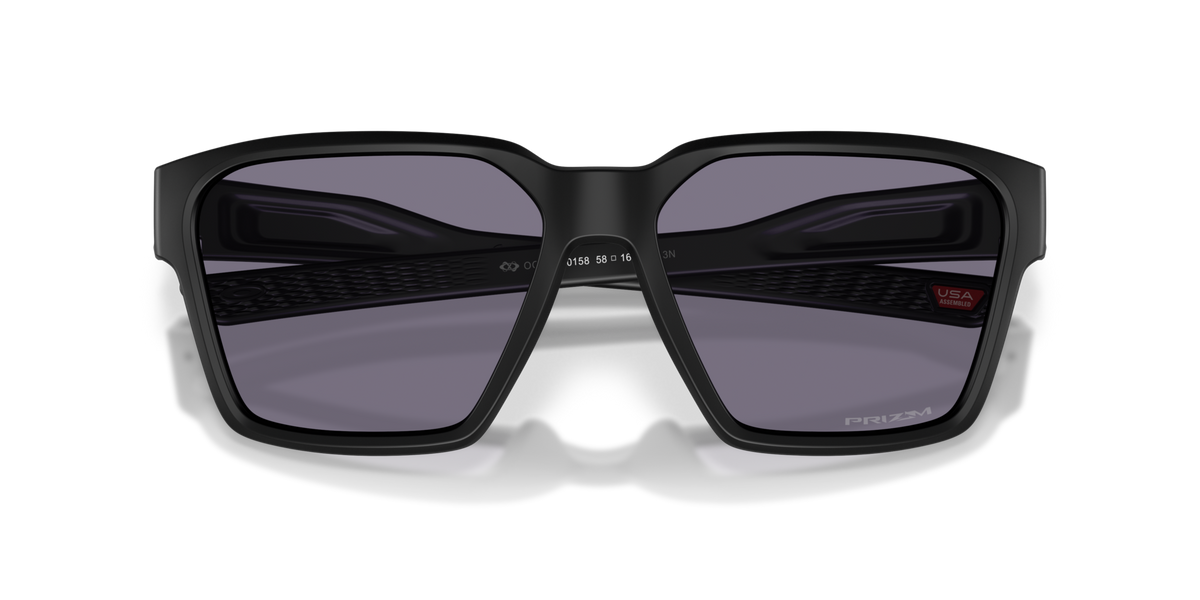 Oakley OO9497 01 matte black sunglasses 58mm folded view
